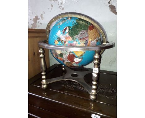 A terrestrial globe inlaid with various semi-precious stones, height 46cm. 