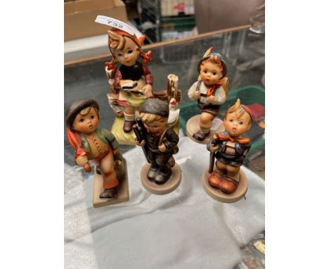 A group of five Goebel figures.The girl with geese sitting down has right arm glued / fixed. The "Chimney Sweeper" presents c