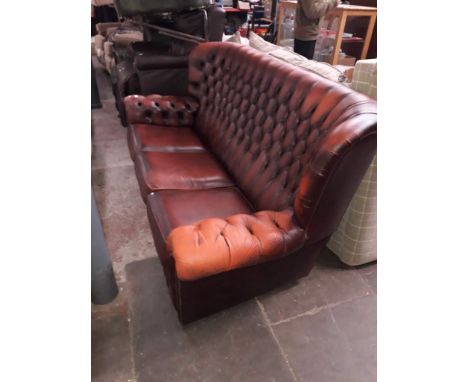 A brown Chesterfield 3 seater sofa. 