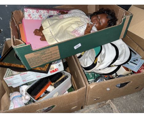3 boxes of assorted items including clock, doll, navy hats, etc 