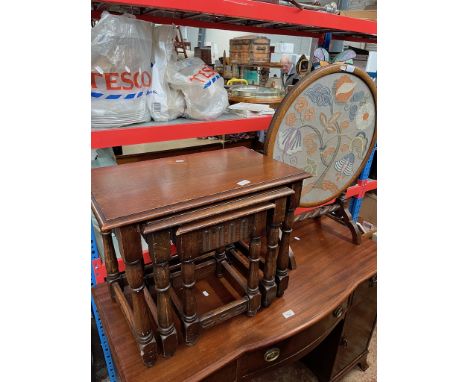 An oak nest of tables and an embroidered firescreen/ coffee table. 