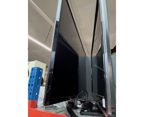 A LG-43UM7450PLA Television with remote and manual 