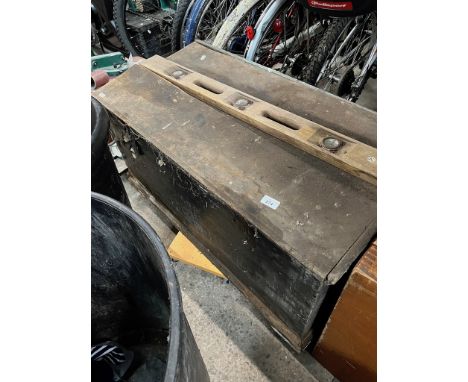 A fitted tool chest containing various joiner's woodworking tools including old planes etc.