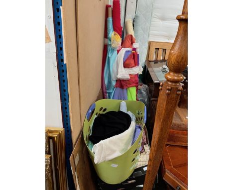 Approximately 40 rolls of fabric together with four boxes of fabric including African wax print fabrics, all ex shop stock. 