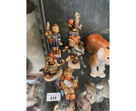 5 Hummel figures - 1998 first issue of 'On Parade' with 4 other figures all pre-1972The girl with basket, sitting has a small