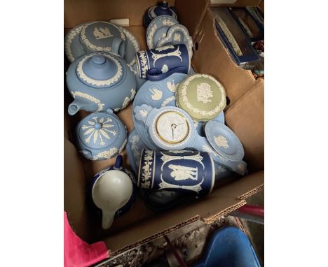 A box of mostly blue and white Wedgewood jasperware including teapot, barometer, jugs, lidded dishes etc. 