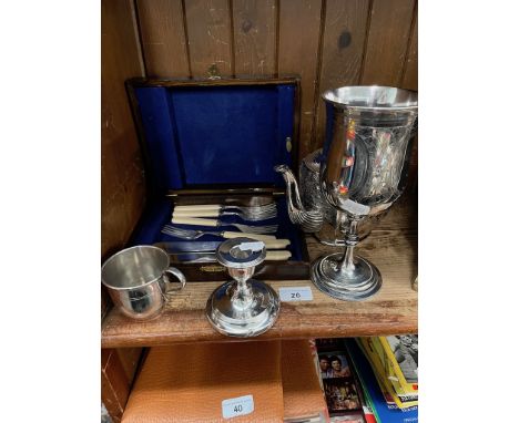 A collection of EPNS ware to include tea pot, a large goblet, a cup, etc and a silver candlestick holder. 