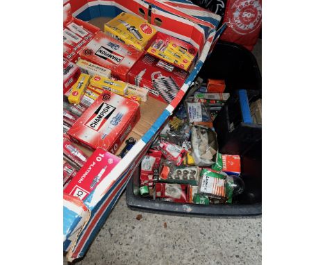 Two boxes of vehicle light bulbs &amp; spark plugs. 