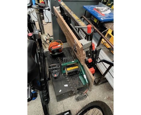 A Black &amp; Decker Workmate 2000 work bench, a joiner's box with tools, a Black &amp; Decker electric chainsaw and an elect