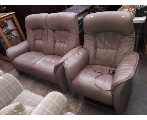 A German Himolla brown leather 2 seater sofa and matching electric recliner armchair. 