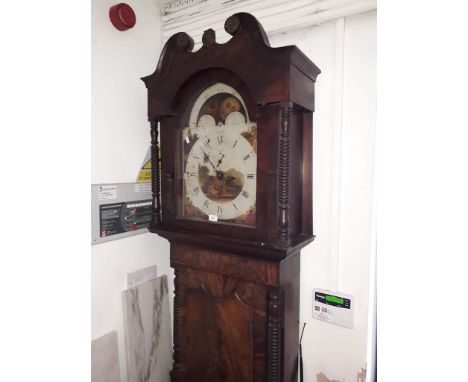A Georgian mahogany eight day longcase clock with moon dial, weights and pendulum. 