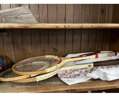 Two vintage tennis outfits size 10 and three vintage rackets. 