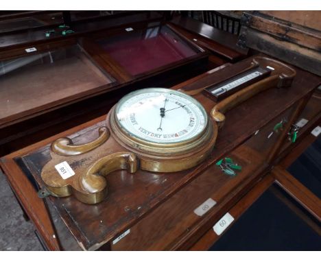 A mahogany cased banjo barometer with mercury thermometer. 