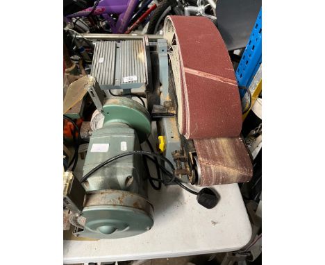 A Delta belt sander and a bench grinder 