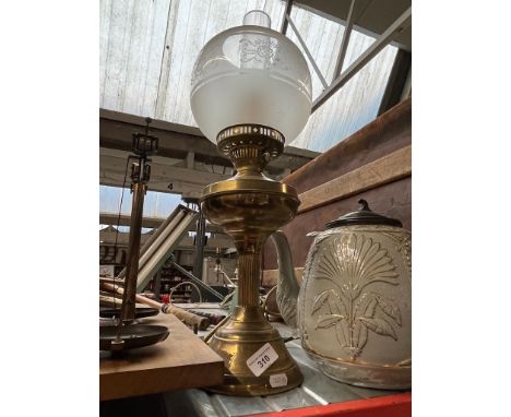 A brass oil lamp converted to electrical. 