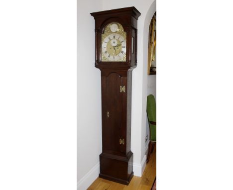 An 18th century Channel Islands longcase clock by Nicolas Blondel the brass arched dial signed on a silvered roundel to the a