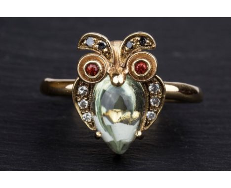 A charming and unusual 9ct gold, diamond, ruby and rock crystal 'owl' ring ring size L.