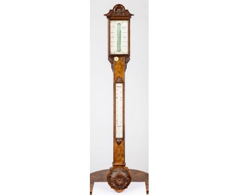 A 19th century stick barometer by J. Cail arched pagoda form pediment with applied floral decoration above an angular set ivo