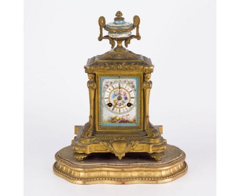 A French gilt metal mantel clock chime movement, circular Roman numeral chapter face set in rectangular Sevres style plaque, 