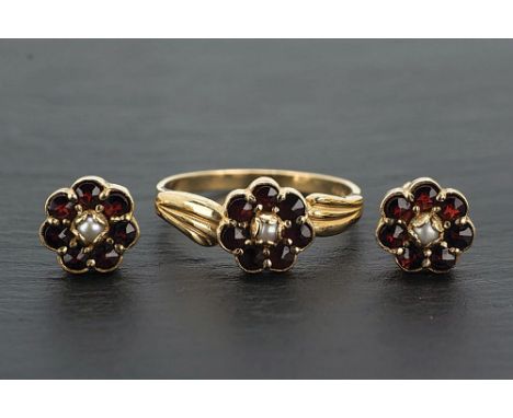 A 9ct yellow gold, ruby and seed pearl ring in a floral cluster within foliate shoulders, ring size M½, together with a pair 