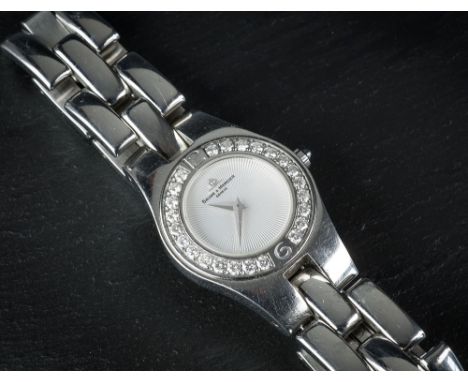 A Baume & Mercier ladies stainless steel & diamond Linea Quartz wrist watch c.2003, #3286125, the silver sunray dial with dau