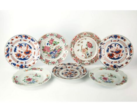 Four late 18th / early 19th century Chinese export famille rose plates bearing floral enamel decoration; together with three 