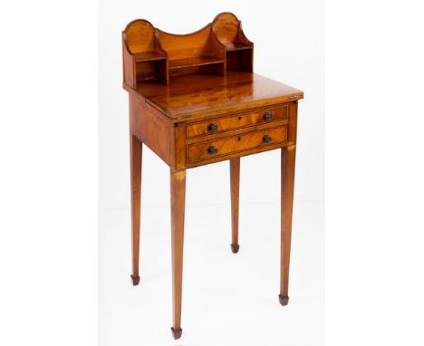 A ladies satinwood miniature Bonheur du Jour 19th century, Sheraton style, the hinged front opening on lopers to reveal green