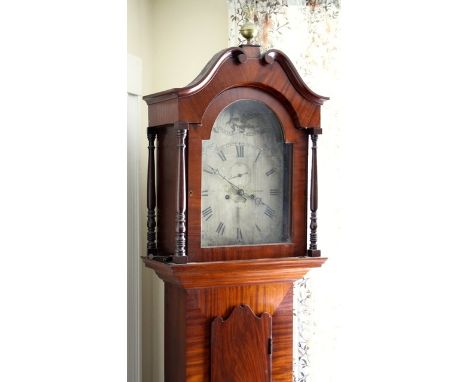 A Thomas De Garis of Guernsey mahogany eight day longcase clock mid-19th century, the silvered arched Roman dial with subsidi