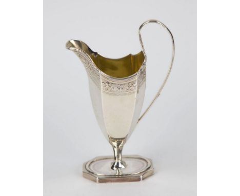 A good George III silver pedestal cream jug Benjamin Mountigue, London 1788, of elongated octagonal ovoid form with high scro