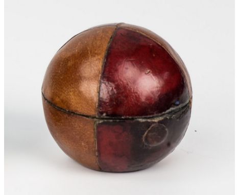 A Victorian novelty travelling inkwell in the form of beach ball, with alternating brown & red leather quadrants, the gilt in