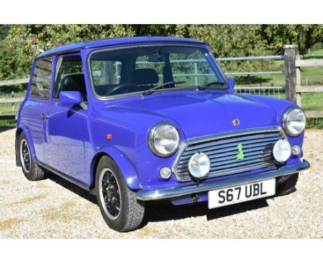 A 1998 Rover Mini 1275 Paul Smith limited edition, registration number S67 UBL, chassis number SAXXNWAZEWD162019, engine numb