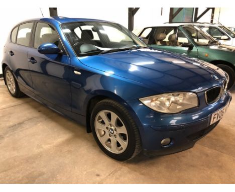 EXTRA LOT:  A 2006 BMW 118D SE, registration number FV06 WBP,blue. This 1 Series five door hatchback has a stamped service bo