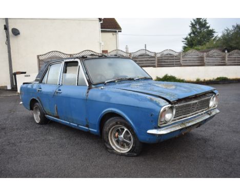 A circa 1969 Ford Cortina Mk II restoration project, blue. This Cortina requires full restoration or would be a great source 