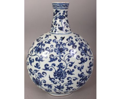 A CHINESE MING STYLE BLUE & WHITE PORCELAIN MOON FLASK, decorated with an overall design of formal scrolling lotus, 9.25in wi