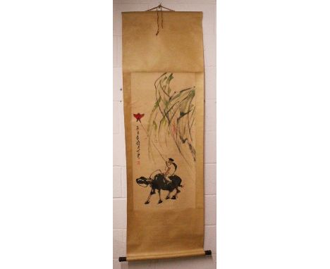 ANOTHER CHINESE HANGING SCROLL PICTURE, decorated with a boy seated on the back of a water buffalo and flying a kite, and wit