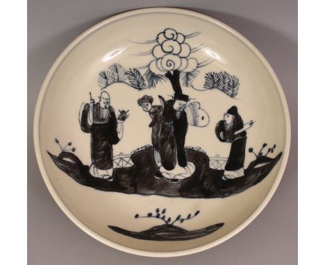 A CHINESE BLUE & WHITE PORCELAIN SAUCER DISH, decorated in a dark tone with a scene of sages, the base with a pseudo seal mar