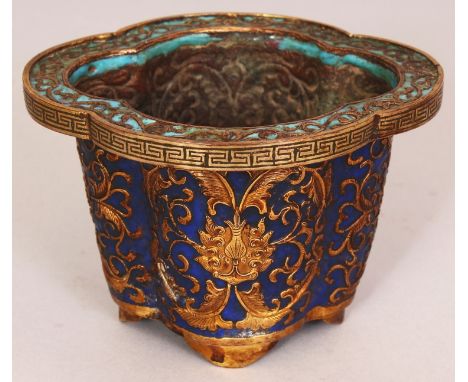 A GOOD QUALITY 19TH CENTURY CHINESE GILT COPPER & CHAMPLEVE JARDINIERE, of quatrefoil section on four bracket feet, the sides