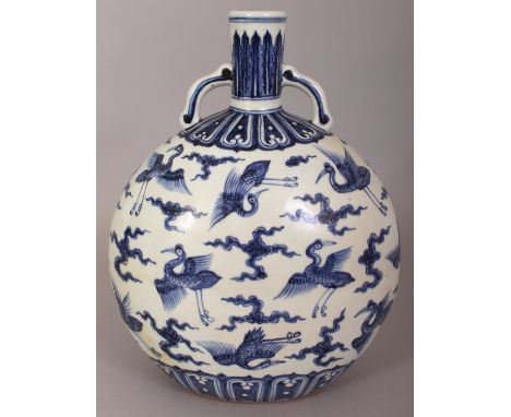 A CHINESE MING STYLE BLUE & WHITE PORCELAIN MOON FLASK, decorated between formal borders with cranes amidst cloud scrolls, th