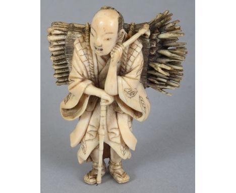 A GOOD QUALITY JAPANESE MEIJI PERIOD IVORY OKIMONO OF A STANDING FAGGOT GATHERER, unsigned, the reed bound faggots slung over