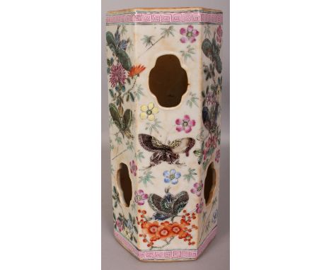 A CHINESE FAMILLE ROSE PORCELAIN HAT VASE, of hexagonal section, the sides decorated with butterflies and floral sprays, the 