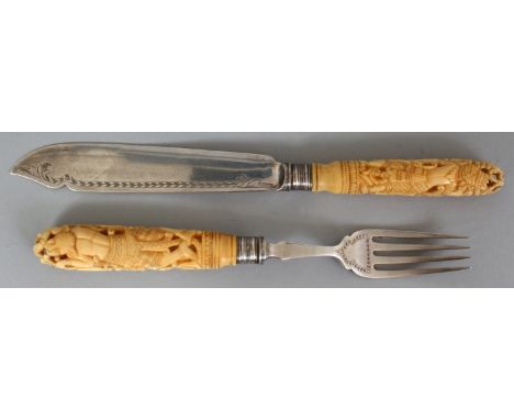 A 19TH CENTURY SILVER PLATED FISH KNIFE & FORK WITH INDIAN IVORY HANDLES, the handles carved with deities, each ivory handle 