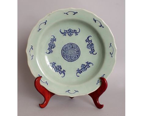 AN 18TH CENTURY CHINESE QIANLONG MARK & PERIOD CELADON GROUND BLUE & WHITE PORCELAIN DISH, probably provincial, together with