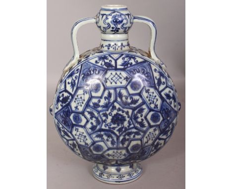 A CHINESE MING STYLE BLUE & WHITE PORCELAIN MOON FLASK, each domed surface decorated with a formal multi-cell design, the bas