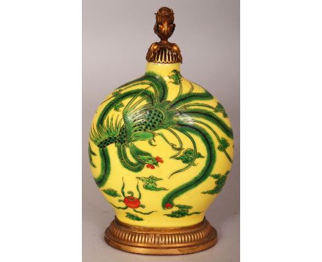 A JAPANESE YELLOW GROUND KUTANI PORCELAIN FLASK, circa 1900, supported on a gilt-metal oval stand and with a fine quality pie