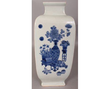 A CHINESE BLUE & WHITE SQUARE SECTION PORCELAIN VASE, the sides decorated with vases of flowers, the base with a Qianlong sea