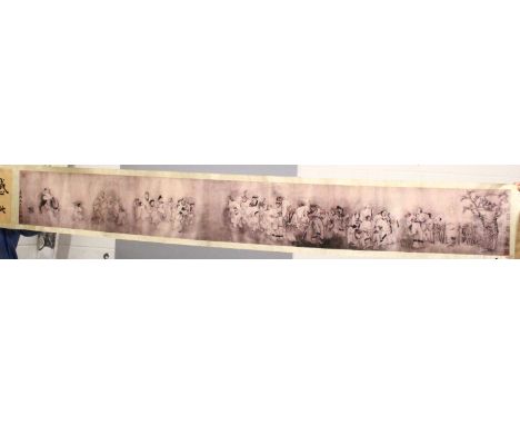 A VERY WIDE CHINESE HORIZONTAL SCROLL PICTURE, decorated with a long continuous figural scene flanked by panels of calligraph