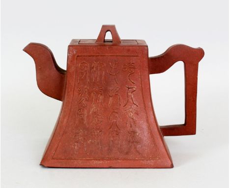 A 19TH CENTURY CHINESE YIXING POTTERY TEAPOT & COVER, of rectangular section, one side of the flaring body moulded in relief 