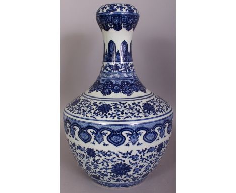 A LARGE CHINESE BLUE & WHITE PORCELAIN VASE, decorated with bands of lotus between formal borders, the base with a Qianlong s