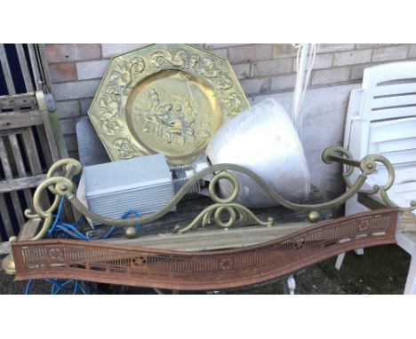 Two fenders, a curtain pole, a brass charger and an industrial lamp