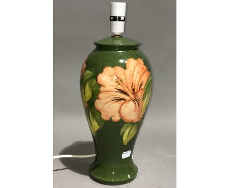 A Moorcroft Hibiscus pattern table lamp